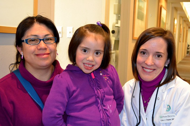 Give Kids a Smile Dentist with Patients