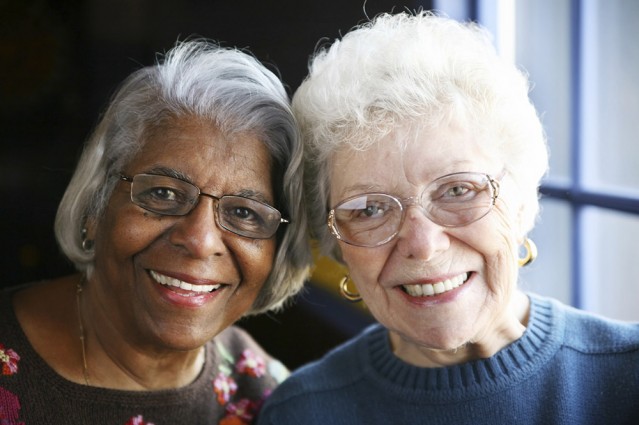 Two senior women smiling