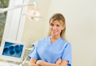 young dental assistant smiling